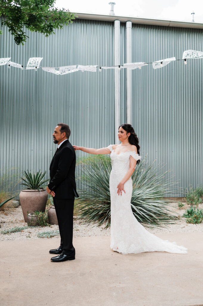 An emotional first look moment before an Austin wedding at Prospect House