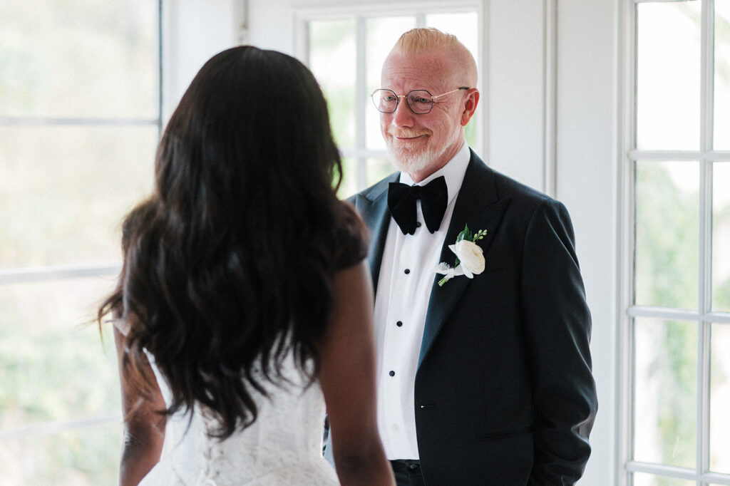 Quiana and David's first look and handwritten cards at Jacob's Well Vineyard in Wimberley, TX