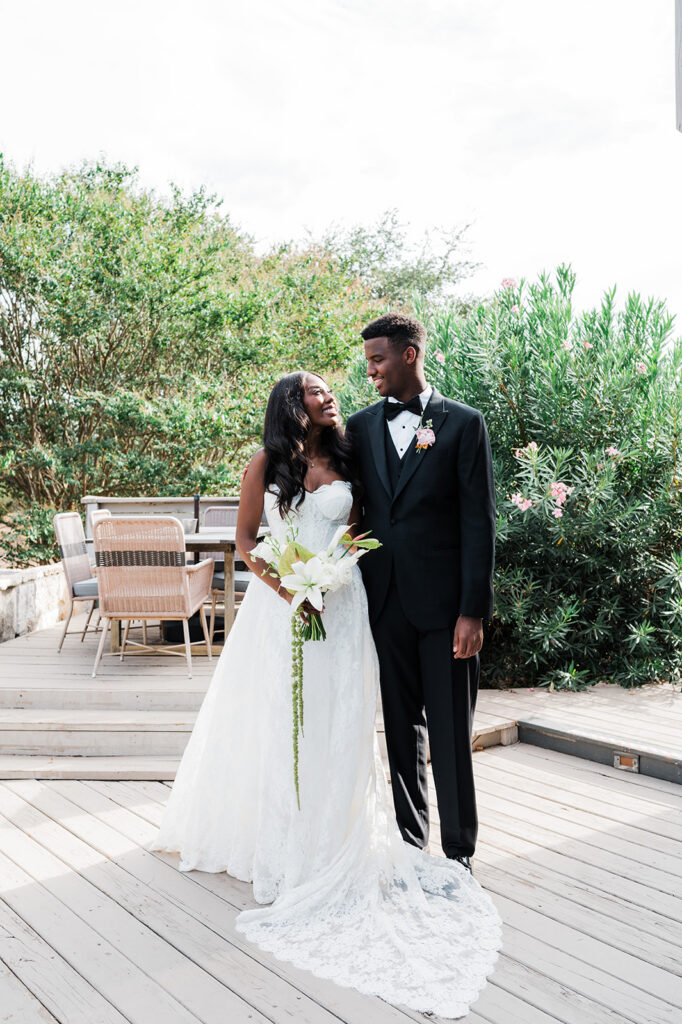 Quiana and David's golden hour portraits with a vintage red truck in Wimberley, TX