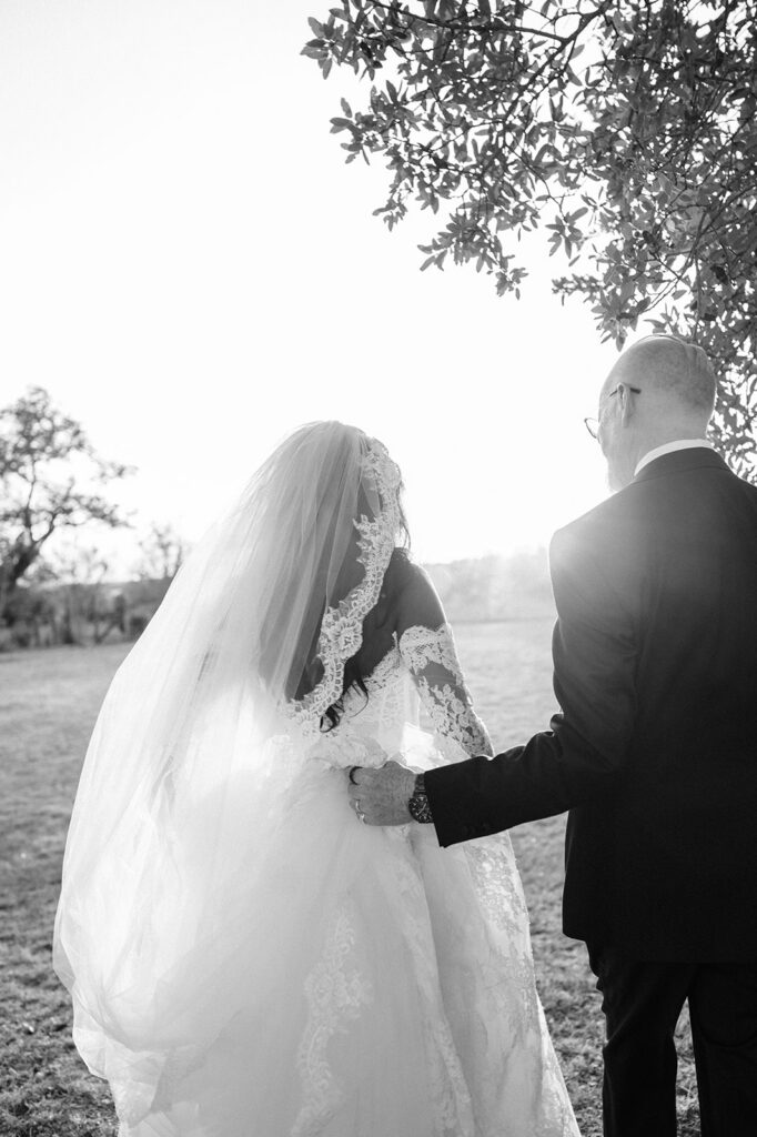 Quiana and David's golden hour portraits with a vintage red truck in Wimberley, TX