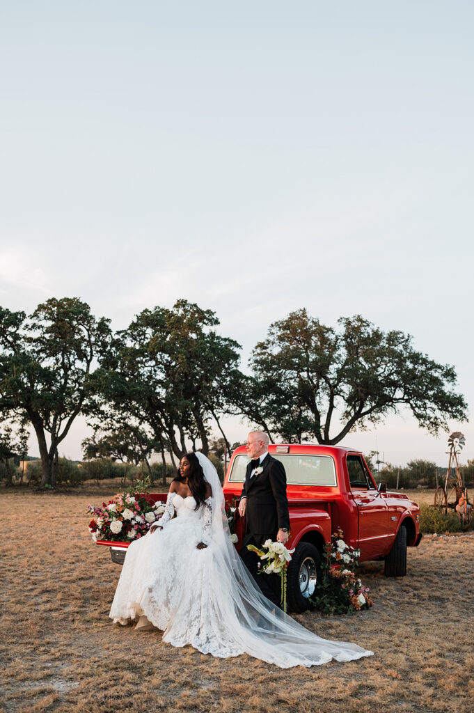 Quiana and David's golden hour portraits with a vintage red truck in Wimberley, TX