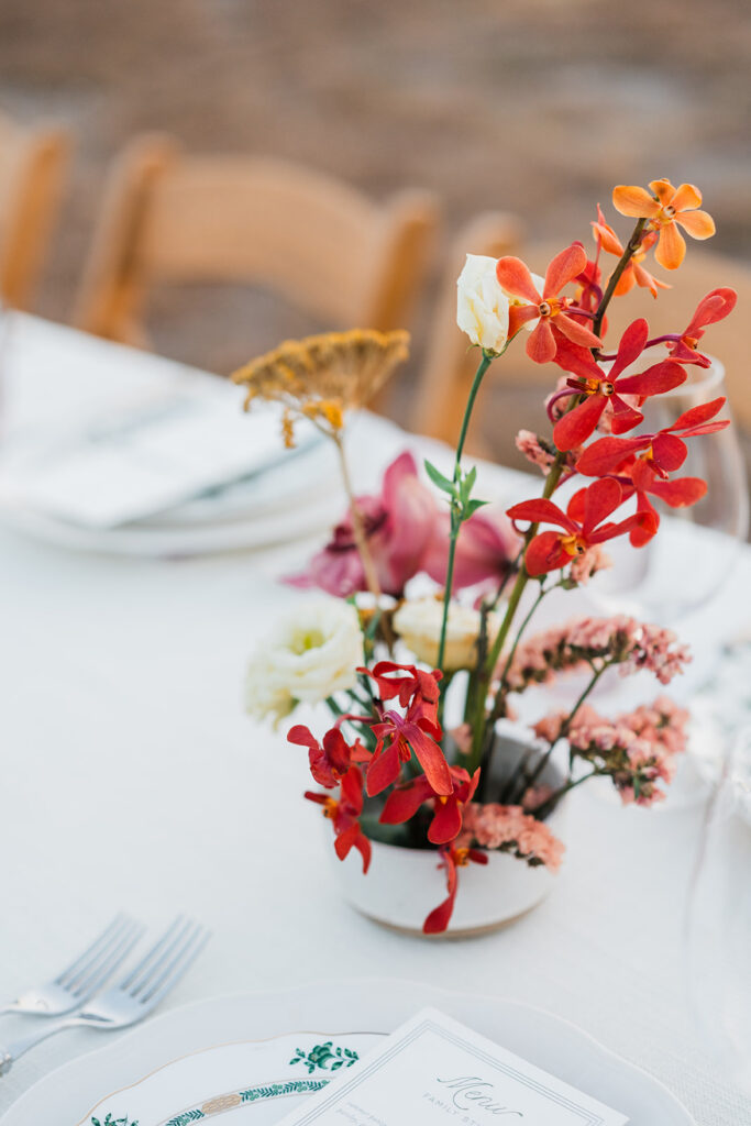 Candlelit long-table reception at Jacob's Well Vineyard in Wimberley, TX