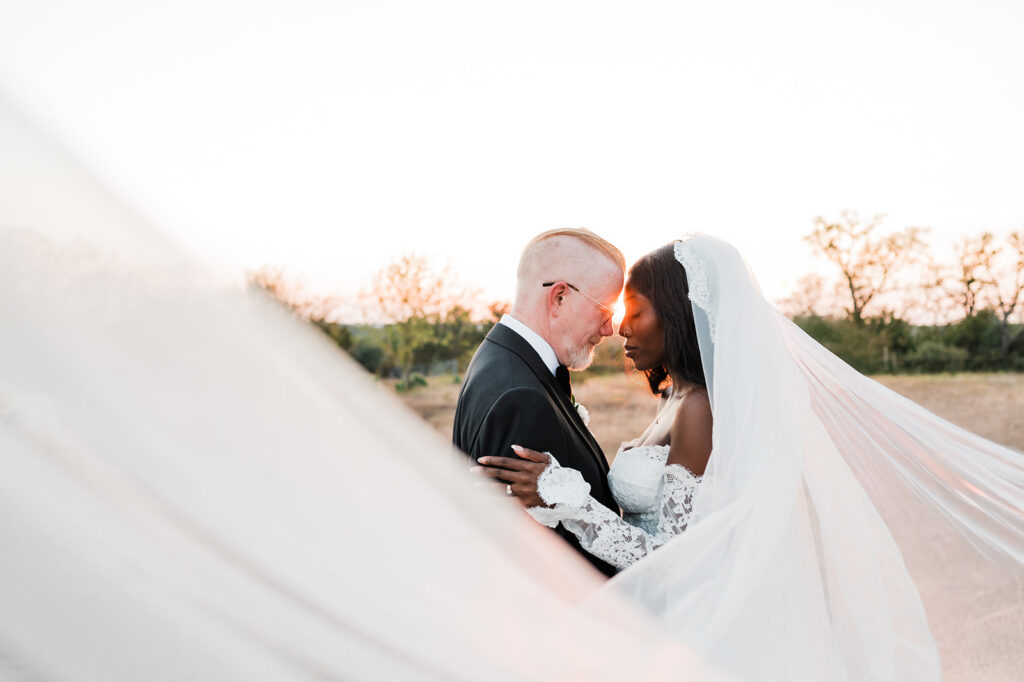 Quiana and David's golden hour portraits with a vintage red truck in Wimberley, TX