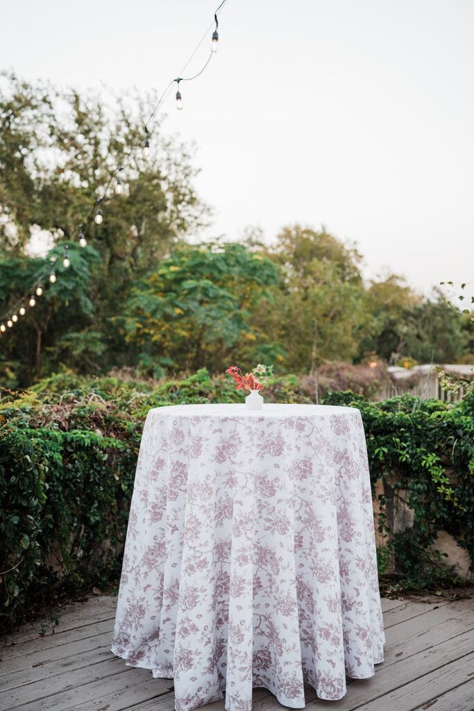 Candlelit long-table reception at Jacob's Well Vineyard in Wimberley, TX
