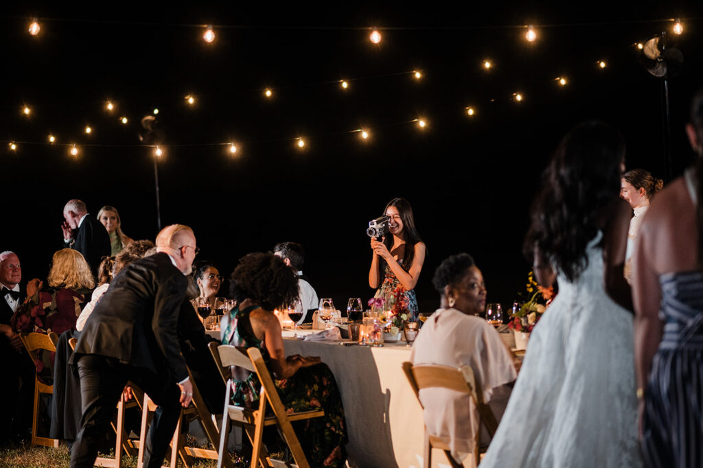 Candlelit long-table reception at Jacob's Well Vineyard in Wimberley, TX